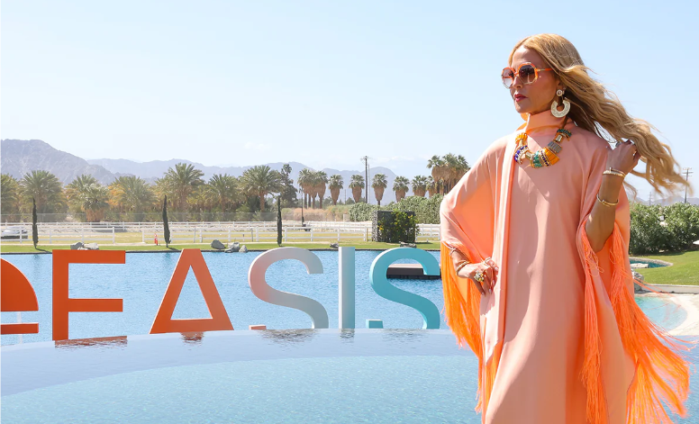 Beautiful Rachel Zoe at her party ZOEasis with the same name, colorful installation, perched atop an expansive pool.