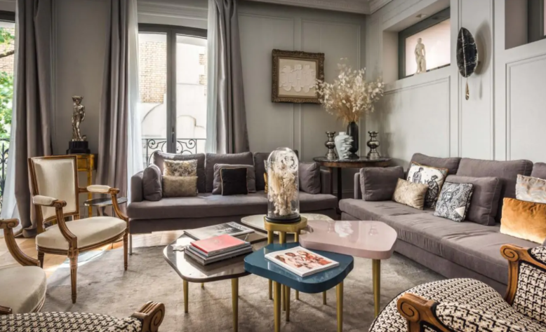 Luxurious living room at Maison Montespan in Paris, featuring sophisticated décor, plush seating, and curated art—an exclusive vacation home rental for discerning travelers and Rock en Seine fans.