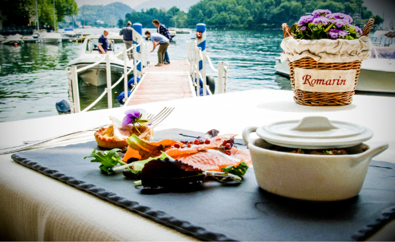 Gourmet dish served at La Tirlindana, a lakeside restaurant on Lake Como, with a scenic view of the water, a private dock, and elegant outdoor dining.