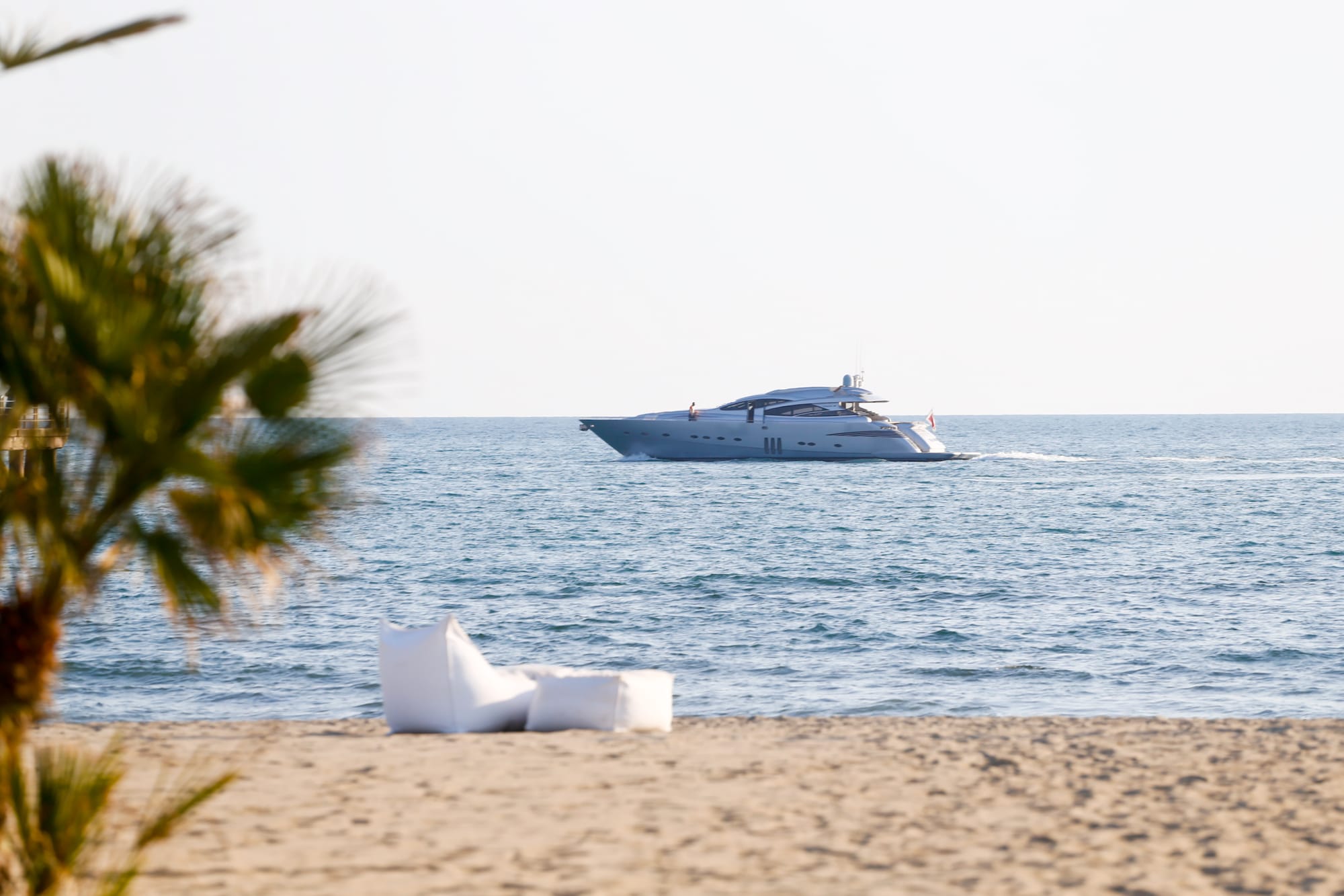 The La Datcha yacht gracefully anchored off the private beach of La Datcha Forte dei Marmi, showcasing an exclusive and luxurious seaside retreat with seamless elegance and nautical charm.
